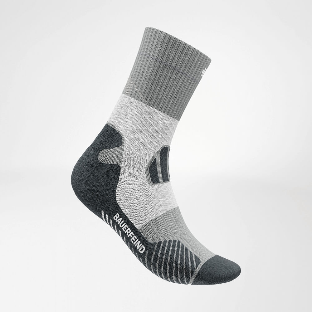 Side view of the gray -white medium -length trail run - running socks