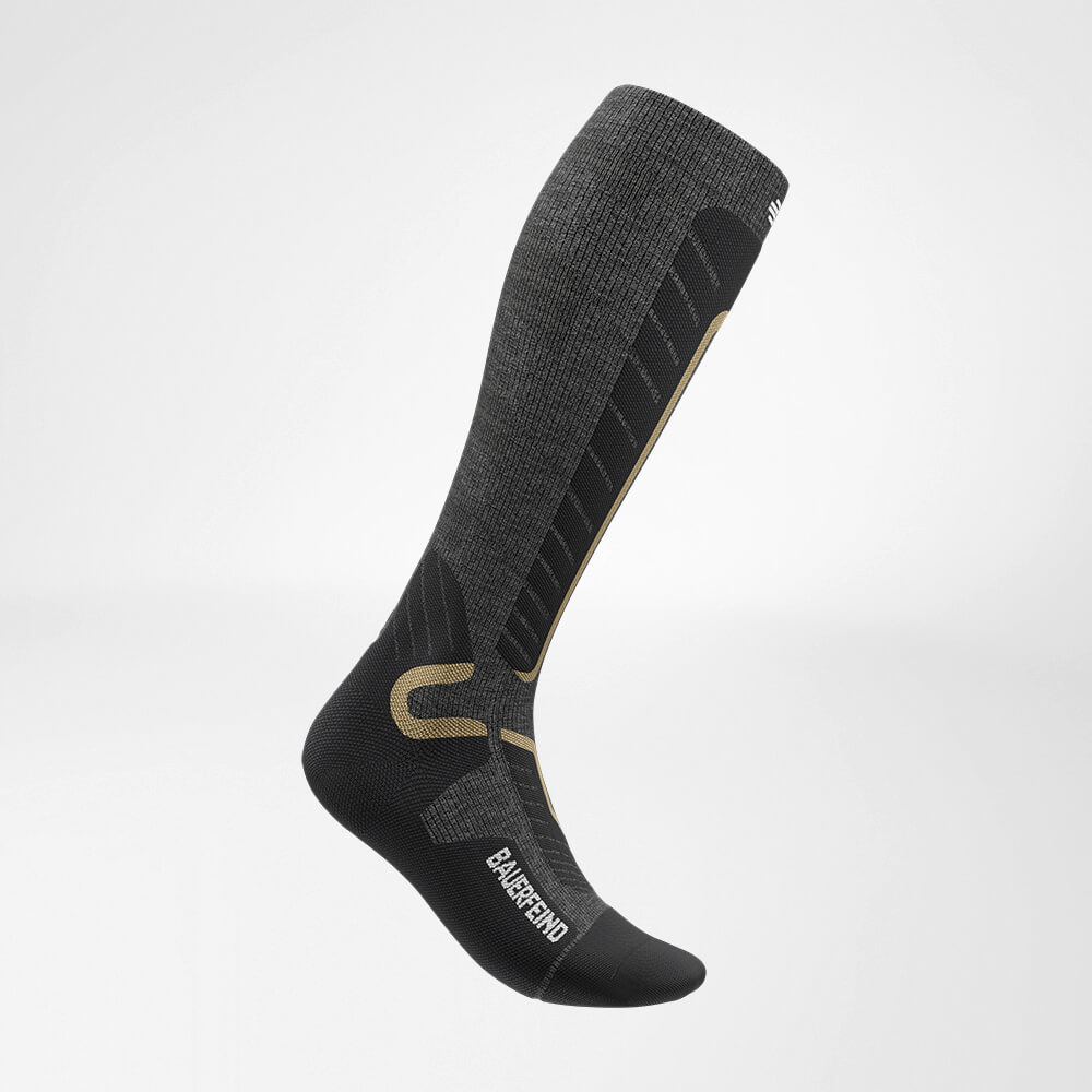 Side view of the grey sports sock for alpine skiing with merino wool