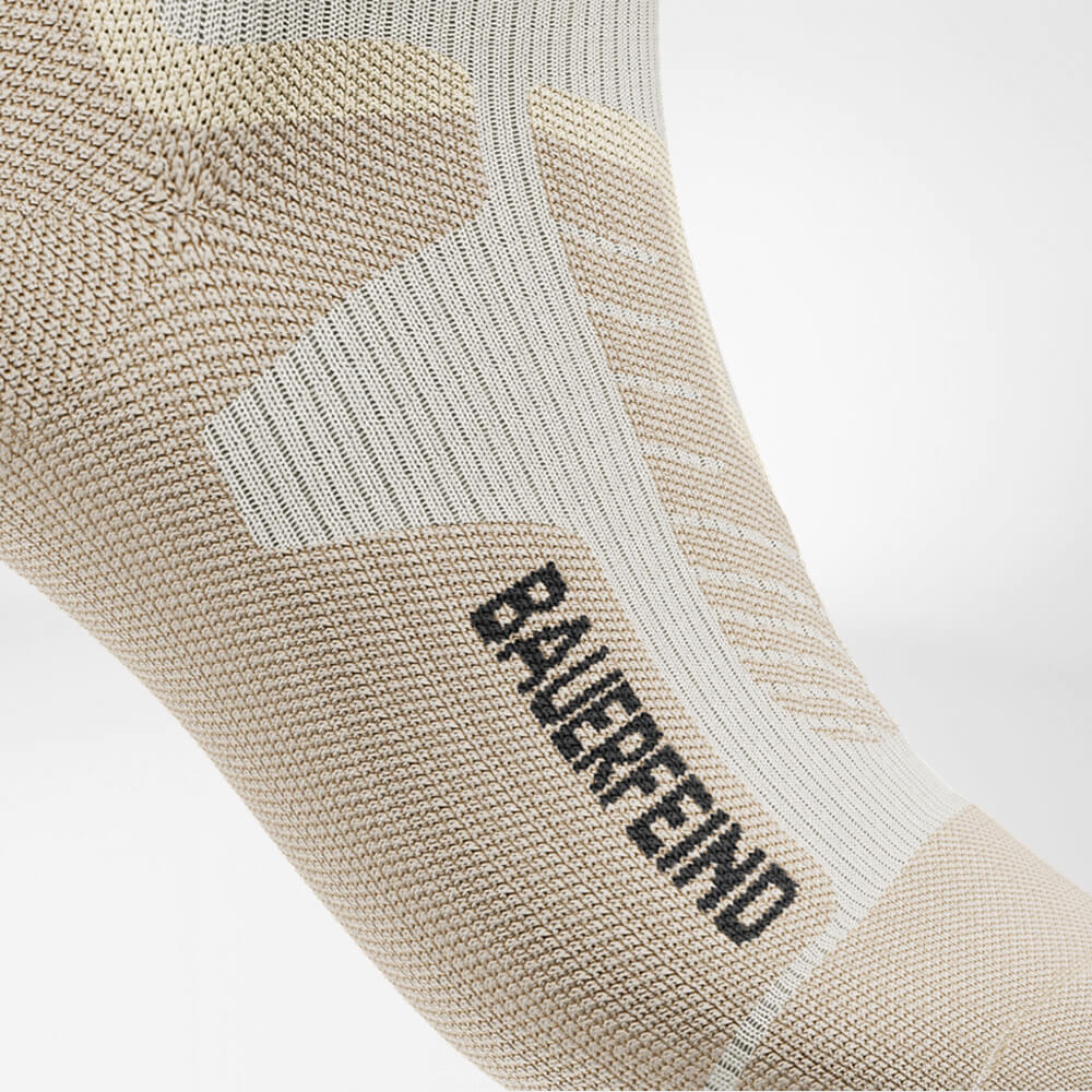 Detailed view on Ski Boot Comfort Zone of the beige sports socks for alpine skiing with merino wool