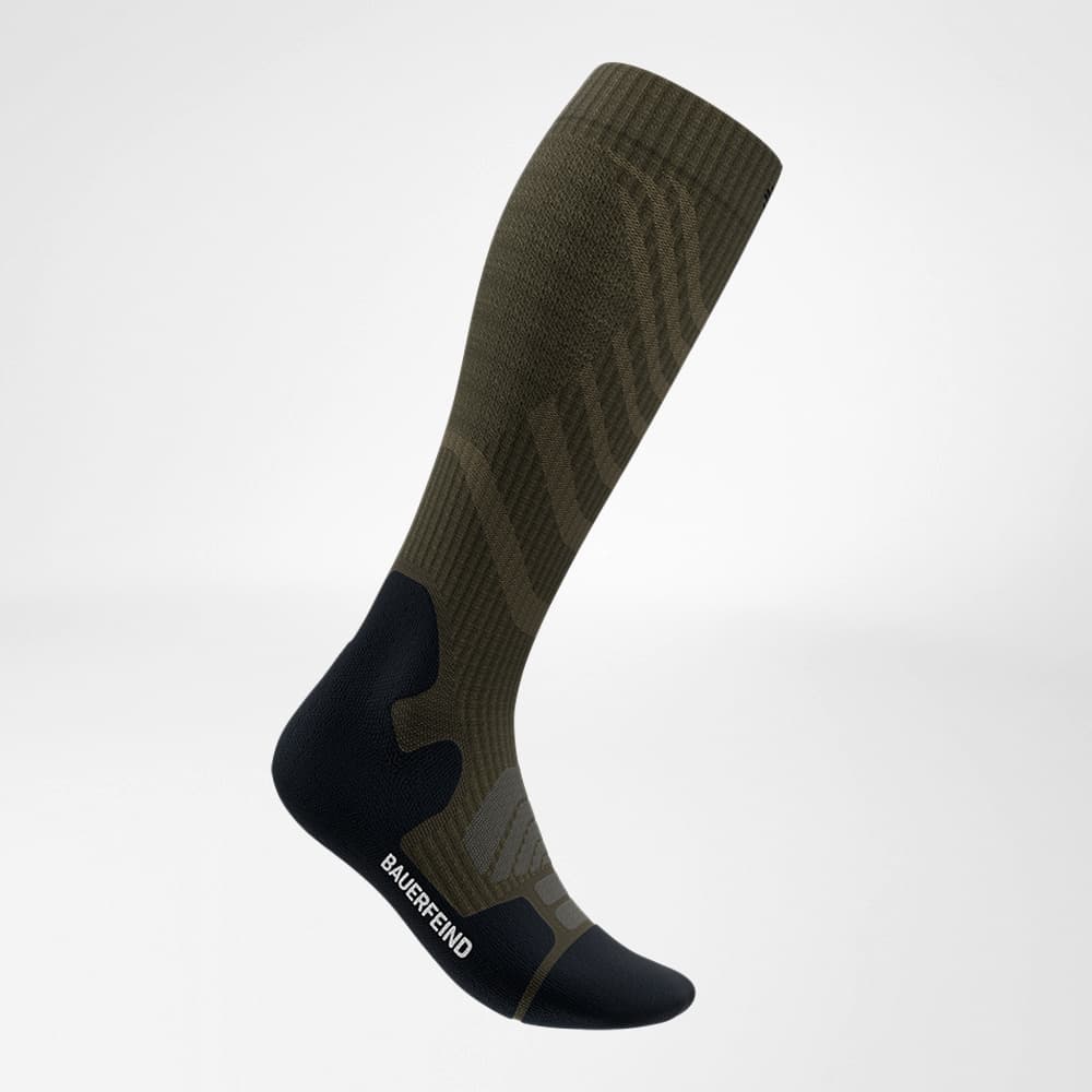 Side view of the merino hiking socks in dark green