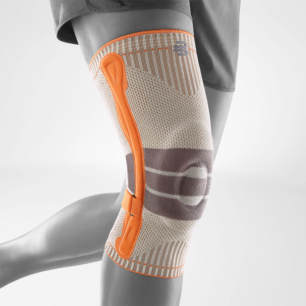 Gray knee brace for outdoor sports on white background