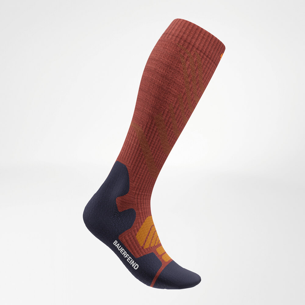 Full view of the Merino Outdoor Socks in Garnet. The combination of a high shaft and seamless design provides protection and comfort.